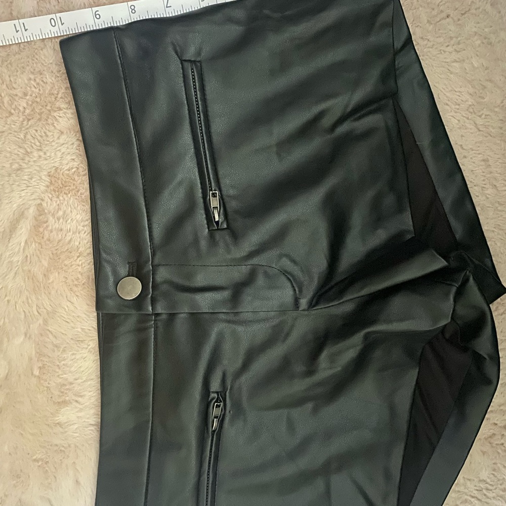 Kittenish leather shorts!